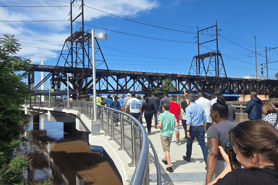 People walking up the ramp to the new Christian to Crescent connector bridge on the Schuylkill River Trail